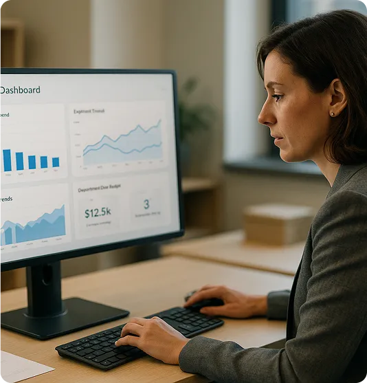 Procurement manager analysing OrderEazi's financial dashboard, displaying expense trends and departmental cost breakdowns.