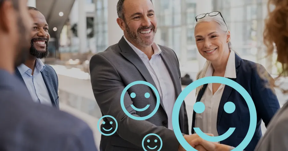 Diverse group of smiling business professionals surrounded by digital smiley face icons.