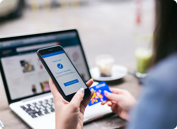 An OrderEazi customer completes a seamless purchase using our mobile app, which displays a "Payment Success" message.