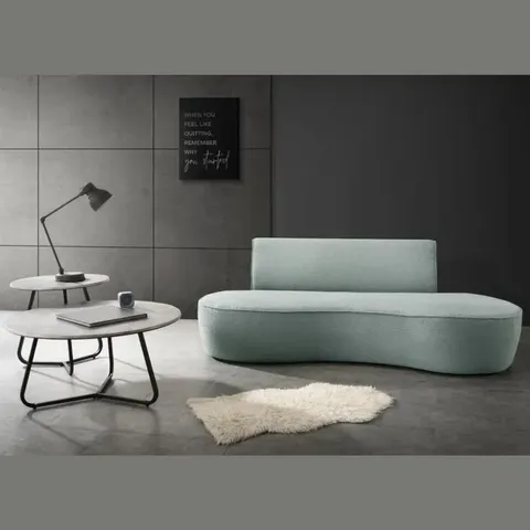 hooten-curved-beige-sofa-lifestyle-min